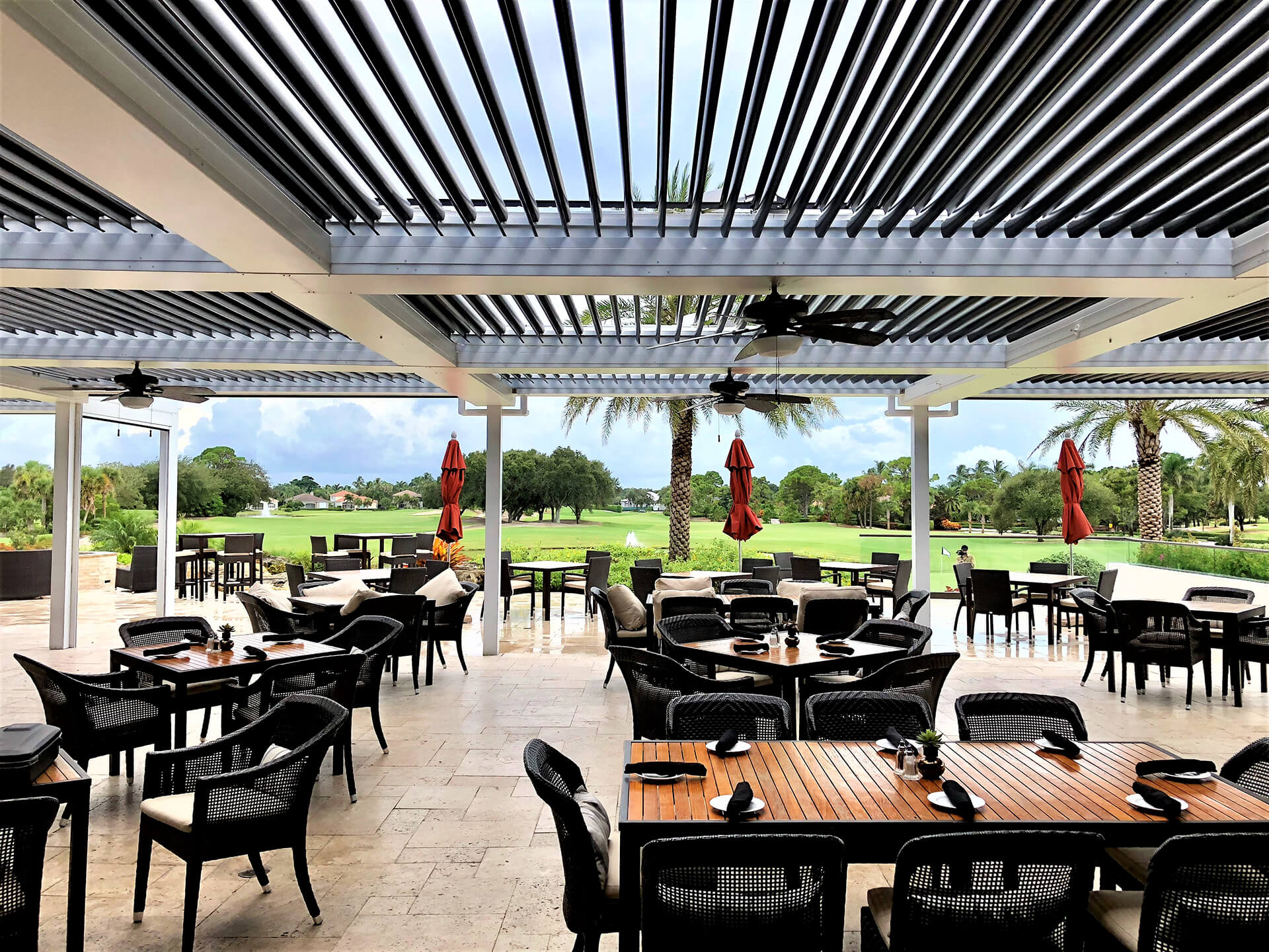 A large Pergola X installed on a commercial dining patio.
