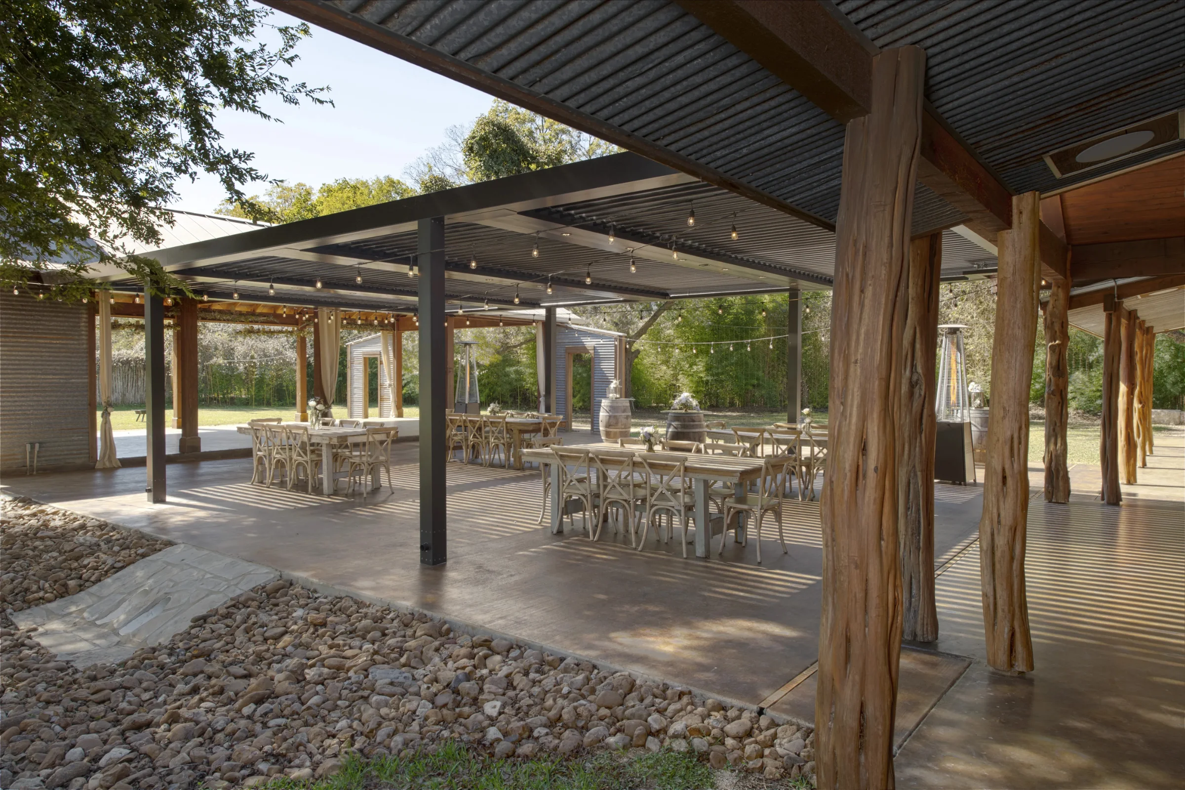 Large community patio covered by StruXure louvered pergola shade structures