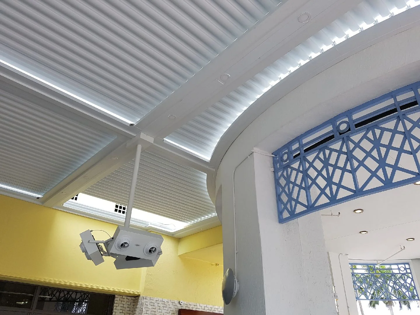 Finished louvered pergola ceiling showing clean joinery and fastener detail on a South Beach project