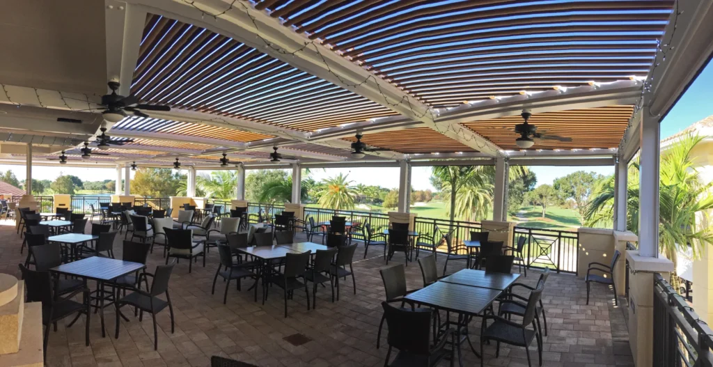 Louvered aluminum roof over a covered terrace in Palm Beach County, the alternative to a polycarbonate pergola roof