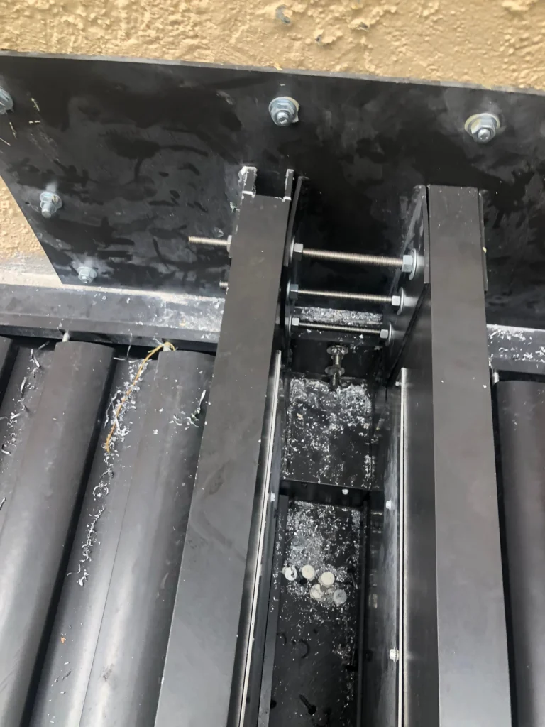 Integrated gutter channel on a louvered aluminum roof, showing how a closed louver roof drains rain