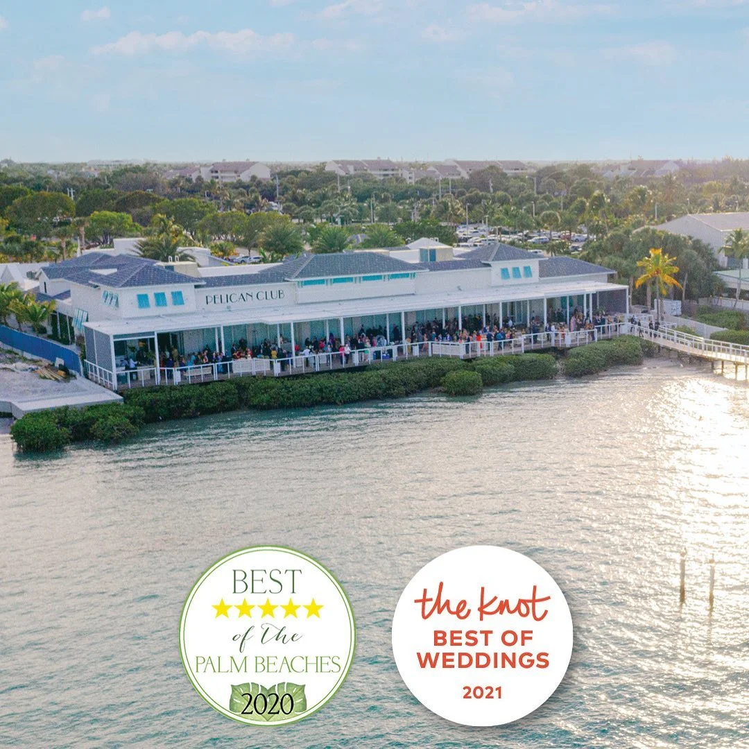 Aerial view of white StruXure louvered pergola at Pelican Club Jupiter waterfront with Best Restaurant award recognition