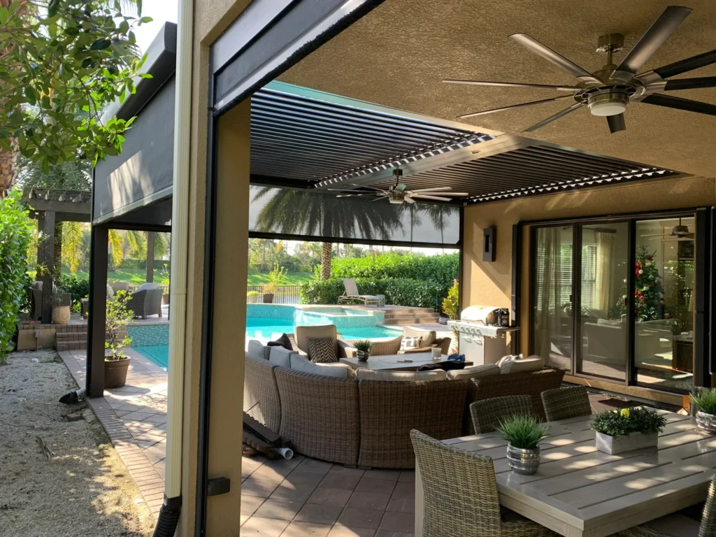 StruXure motorized screens deployed around a South Florida pool patio