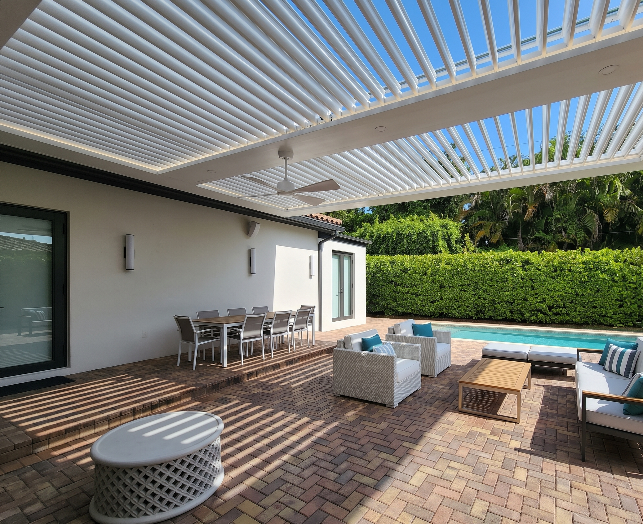 Louvred roof blades holding position during a motorized pergola power outage in South Florida