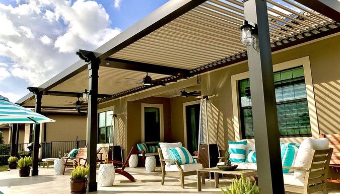 Louvered roof beside a pool